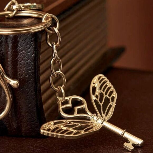 HALLOWEEN SALE Gold Harry Potter Enchanted Flying Key Keychain Bag Charm - Picture 1 of 5